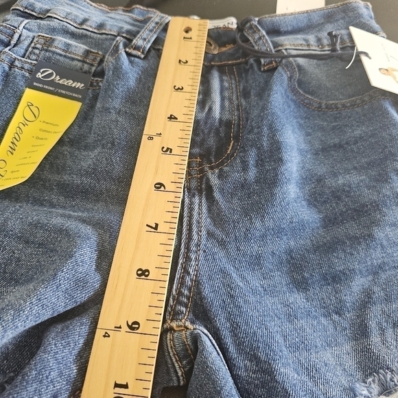 High Rise Rip and Repair Medium Wash with Rigid Front and Stretch Back Jeans NWT - Picture 7 of 15